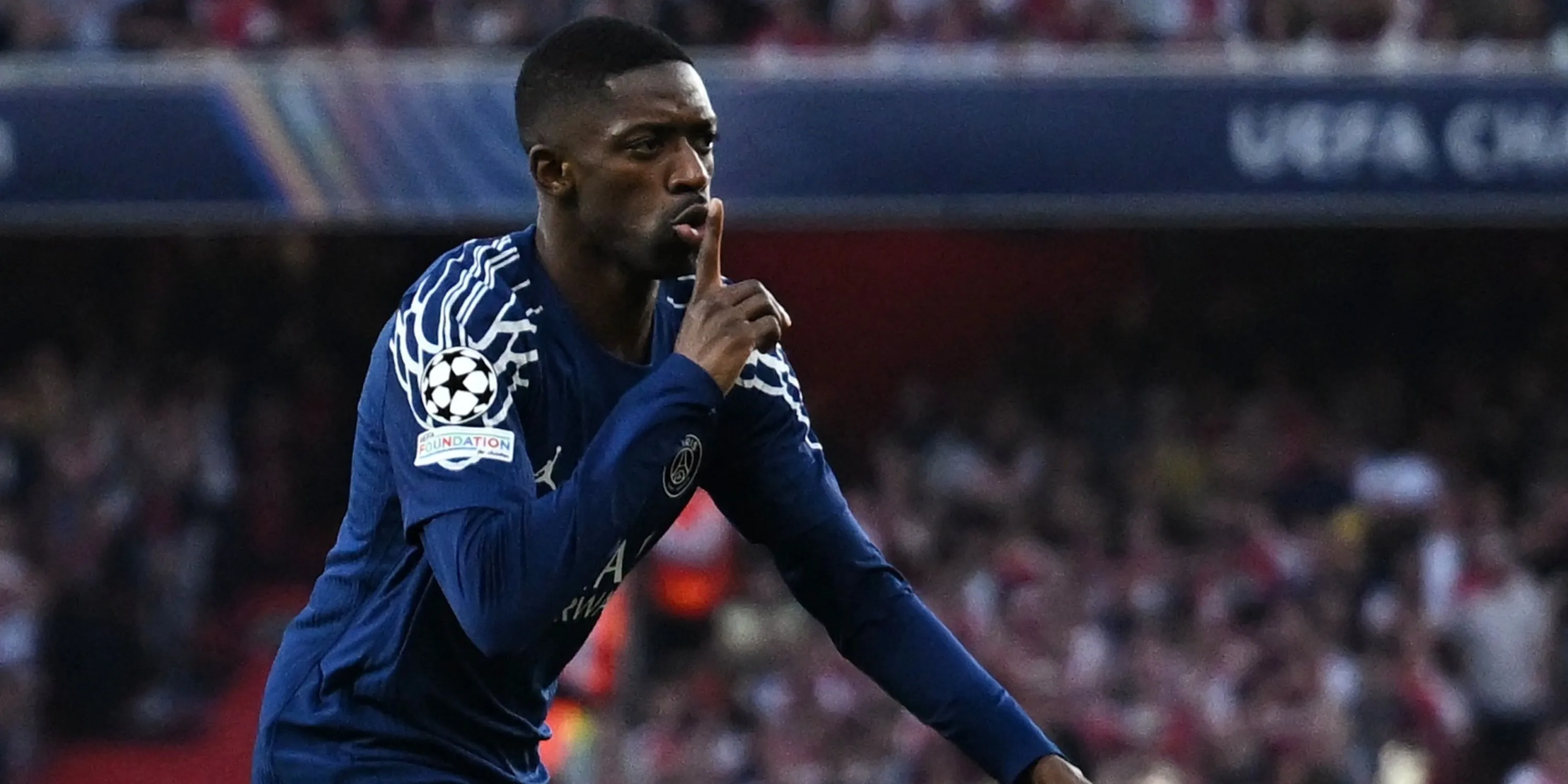 Ousmane Dembele celebrates scoring against Arsenal in the Champions League